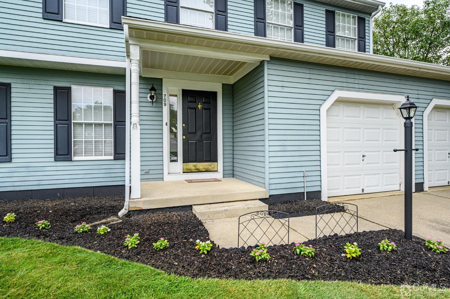709 Henderson Road Lumberton, NJ 08048 - Photo 2 of 46 a front view of a house with garden