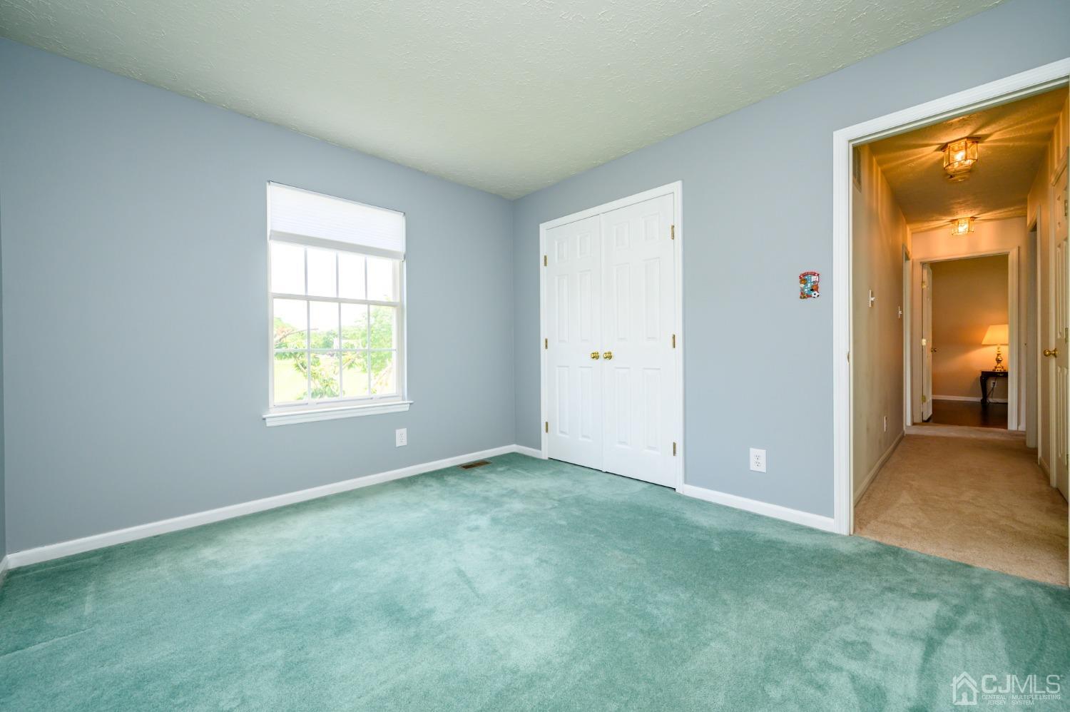 709 Henderson Road Lumberton, NJ 08048 - Photo 23 of 46 an empty room with windows and closet