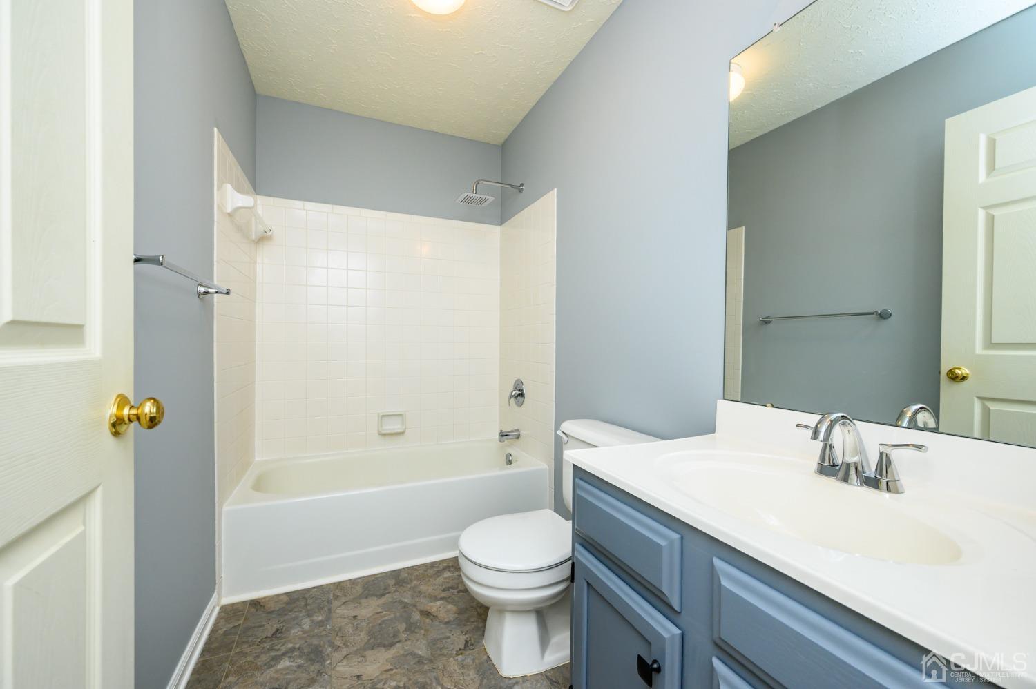 709 Henderson Road Lumberton, NJ 08048 - Photo 28 of 46 a bathroom with a sink a toilet and shower