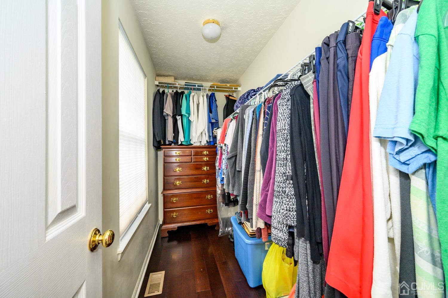709 Henderson Road Lumberton, NJ 08048 - Photo 32 of 46 a view of walk in closet with clothes and shoes