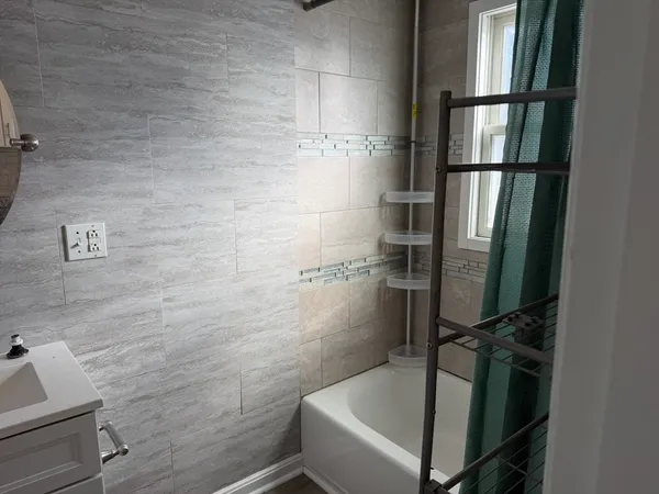 a bathroom with a bathtub