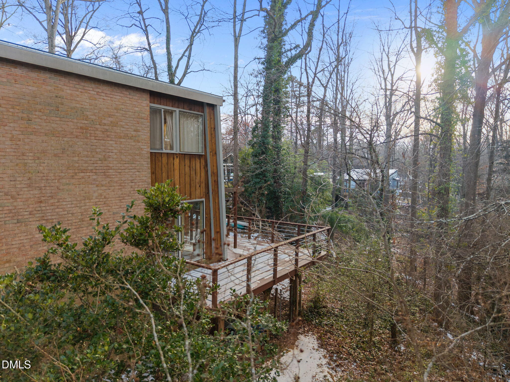 1108 Hemingway Drive Raleigh, NC 27609 - Photo 55 of 68 Spacious wrap-around deck overlooking the private wooded lot