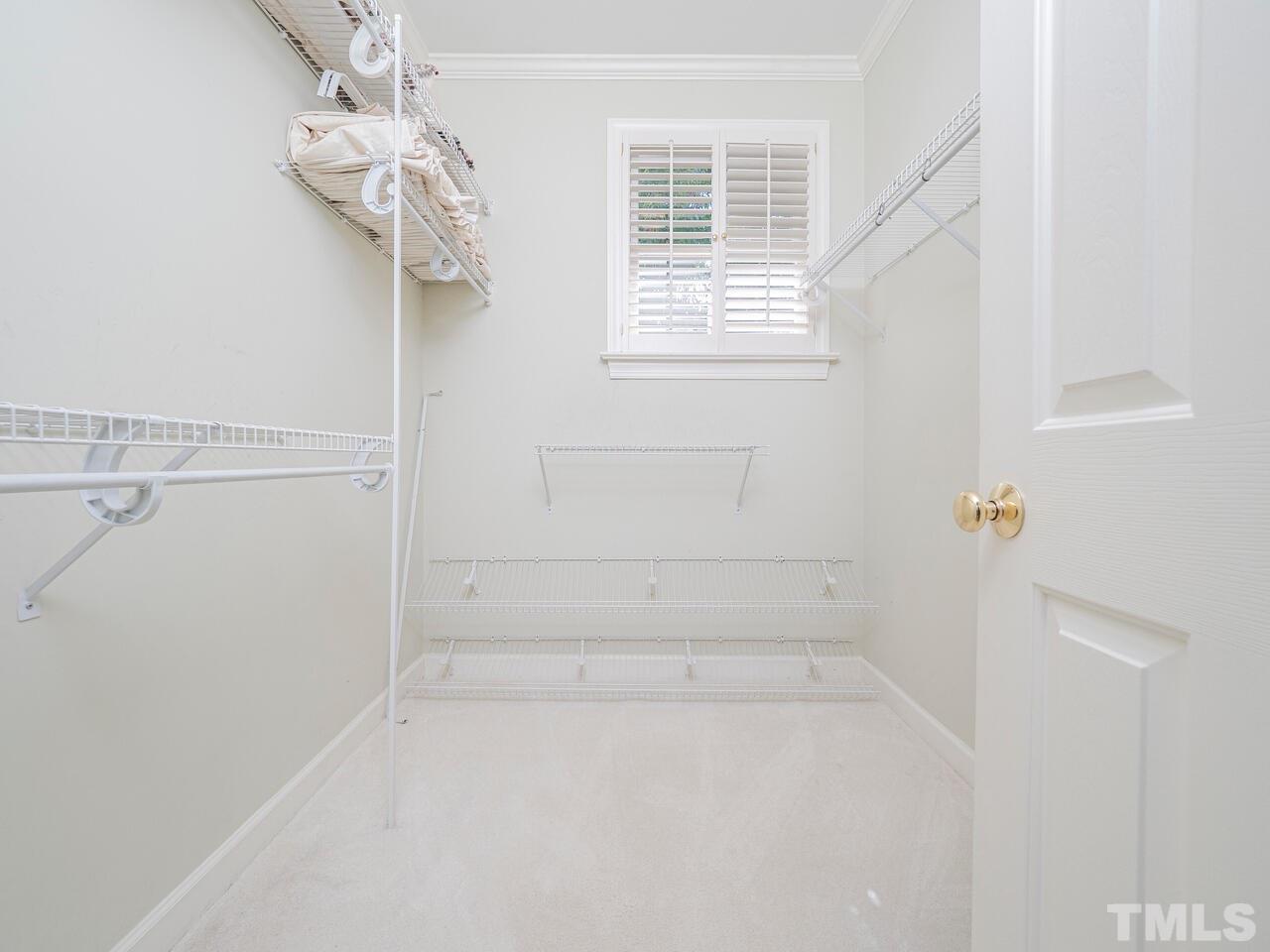 3701 Holly Lane, Unit 302 Raleigh, NC 27612 - Photo 21 of 30 Walk-in master bedroom closet.