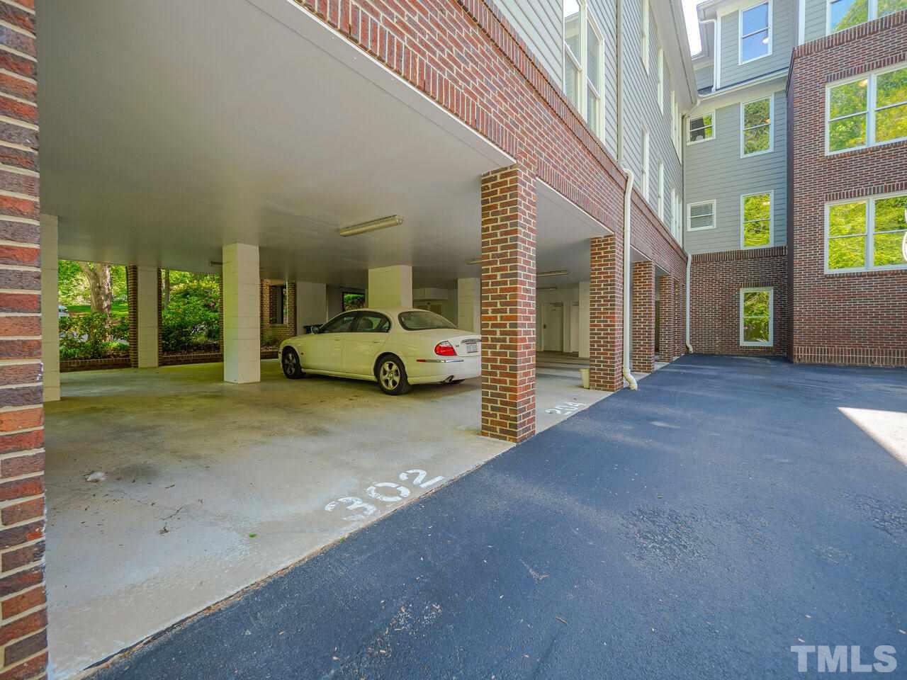 3701 Holly Lane, Unit 302 Raleigh, NC 27612 - Photo 28 of 30 Covered parking in carport.