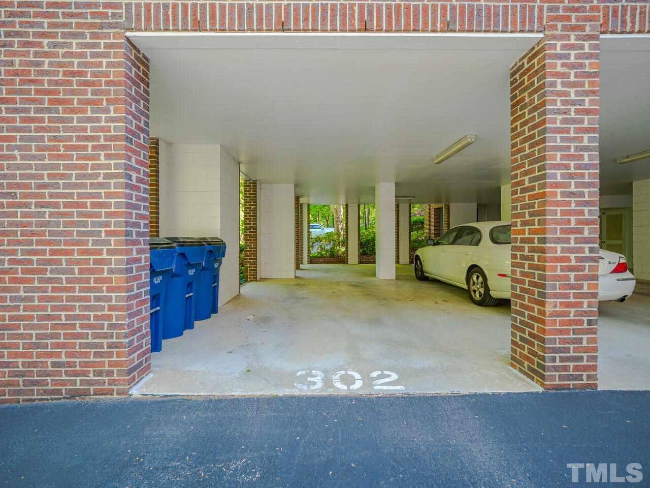 3701 Holly Lane, Unit 302 Raleigh, NC 27612 - Photo 29 of 30 Carport.