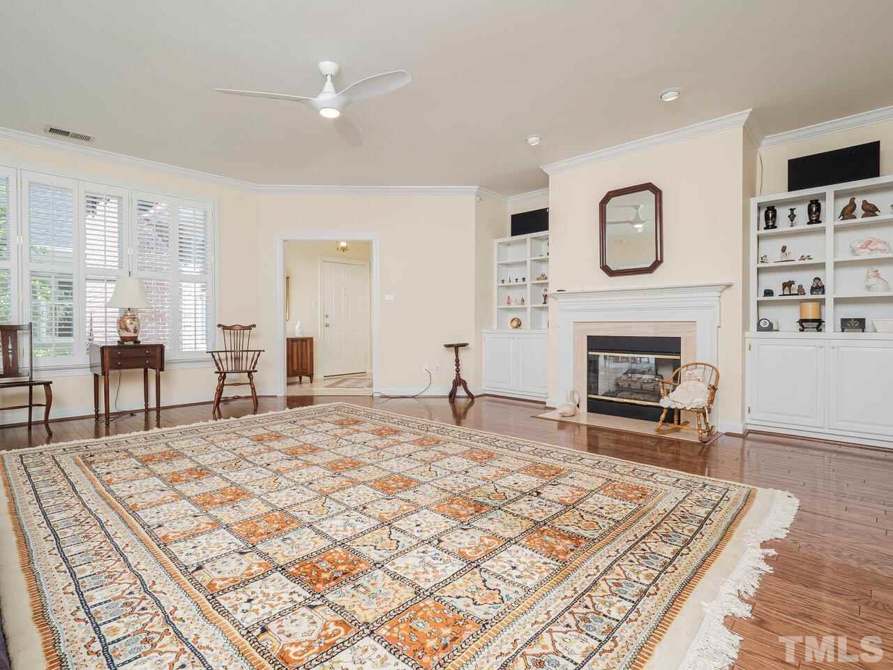 3701 Holly Lane, Unit 302 Raleigh, NC 27612 - Photo 4 of 30 Looking toward fireplace from hallway.
