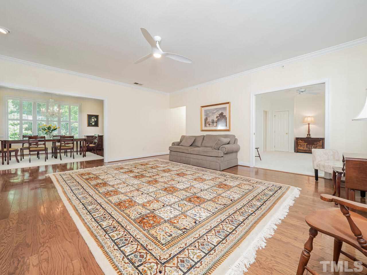 3701 Holly Lane, Unit 302 Raleigh, NC 27612 - Photo 5 of 30 Looking into living room from the front entry foyer.