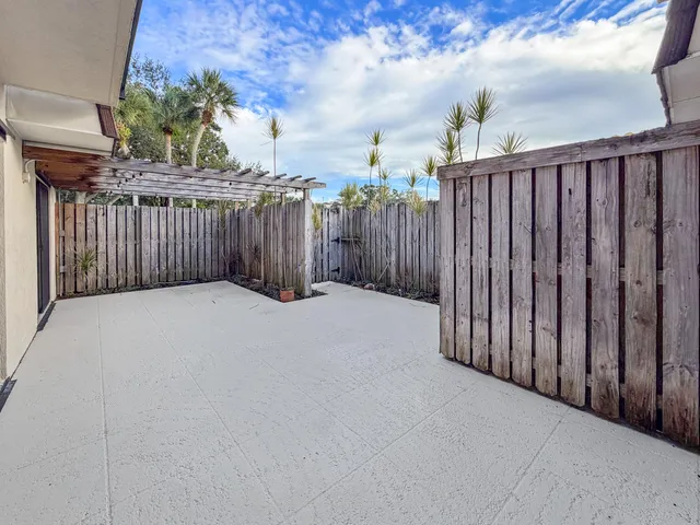 a view of a wooden fence