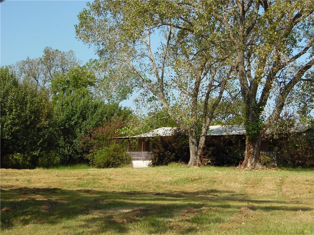 a house view with a swimming pool