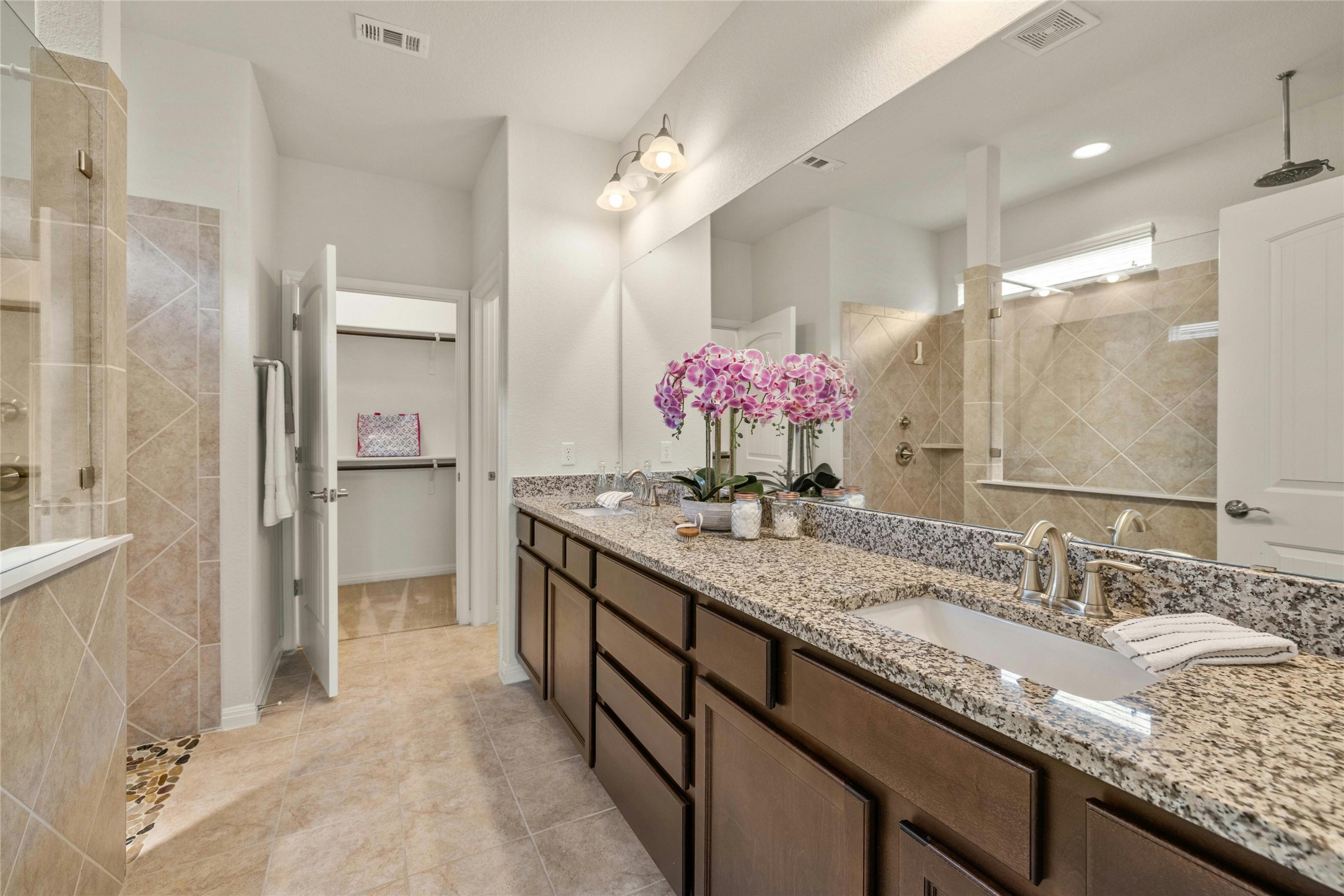 203 Longview Lane Georgetown, TX 78633 - Photo 24 of 37 a bathroom with a granite countertop sink and a mirror