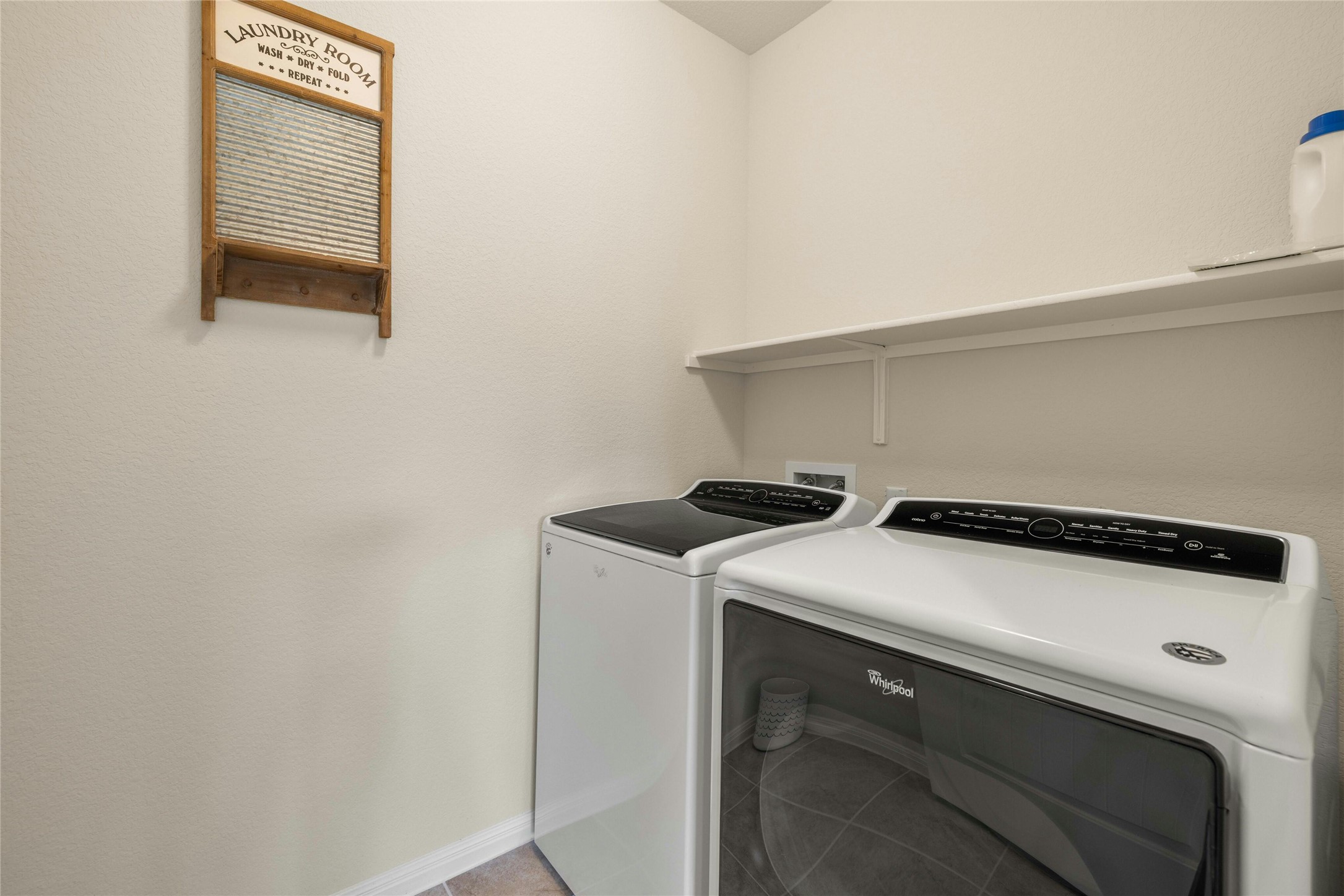 203 Longview Lane Georgetown, TX 78633 - Photo 31 of 37 a utility room with dryer and washer