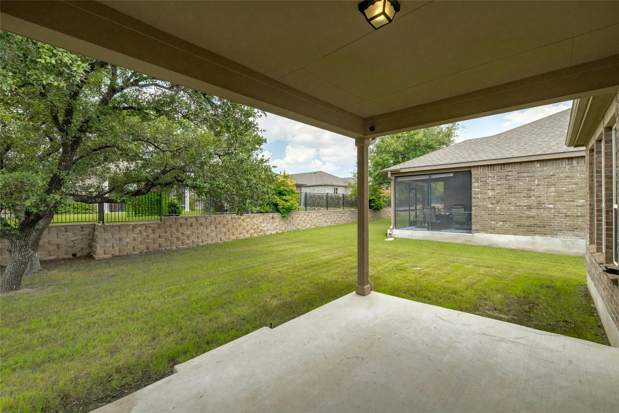 203 Longview Lane Georgetown, TX 78633 - Photo 32 of 37 a view of a backyard with a garden and plants