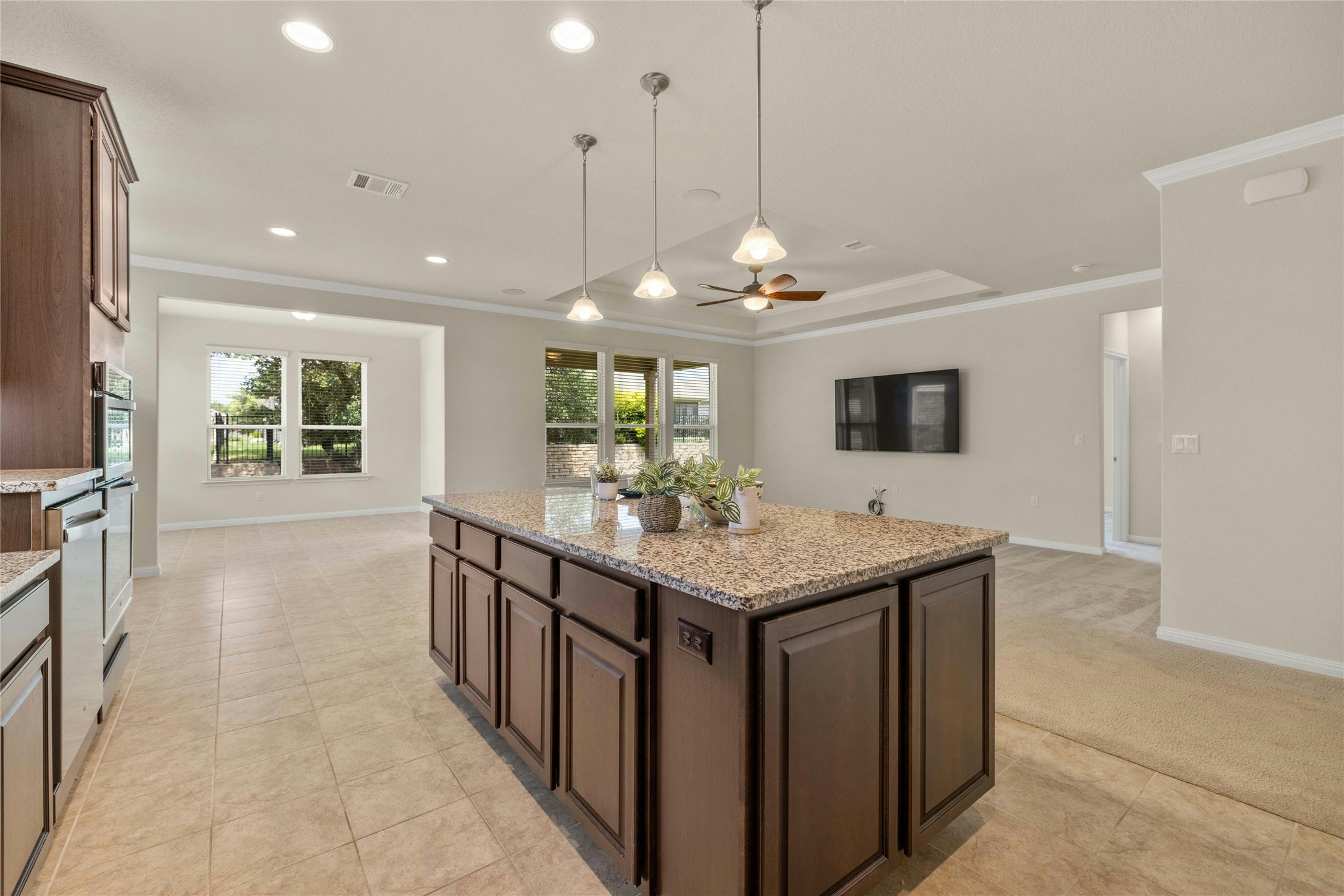 203 Longview Lane Georgetown, TX 78633 - Photo 10 of 37 a kitchen with stainless steel appliances granite countertop counter space and a center island