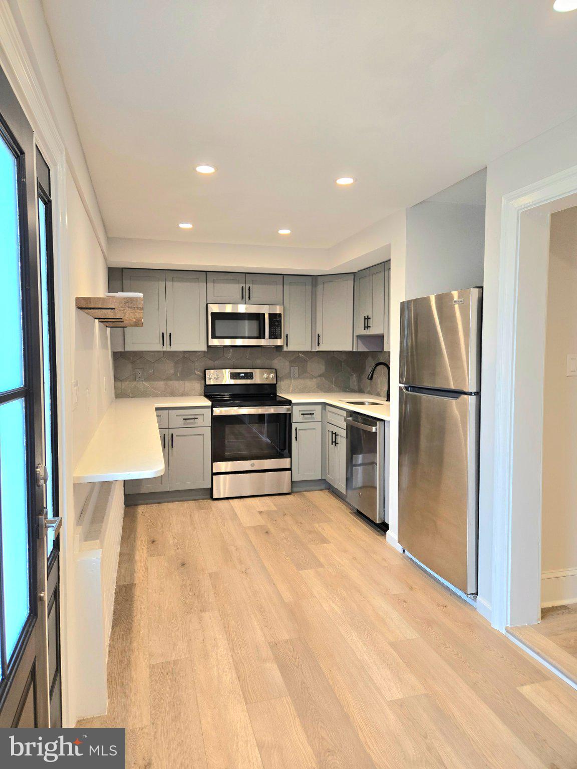 Modern kitchen with sleek finishes.
