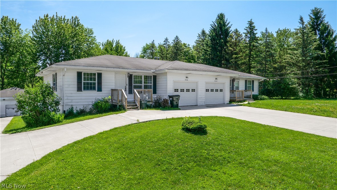 9034 Wiencek Road Streetsboro, OH 44241 - Photo 2 of 21 Front of duplex with expansive circular concrete driveway