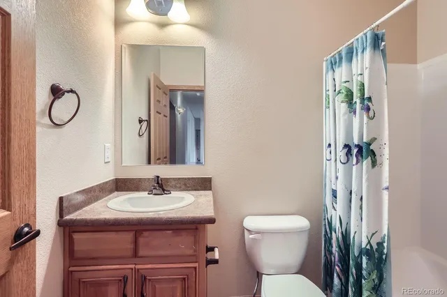 a view of a hallway with washer and dryer
