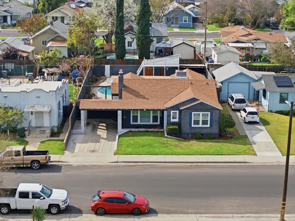 a car parked in front of a house