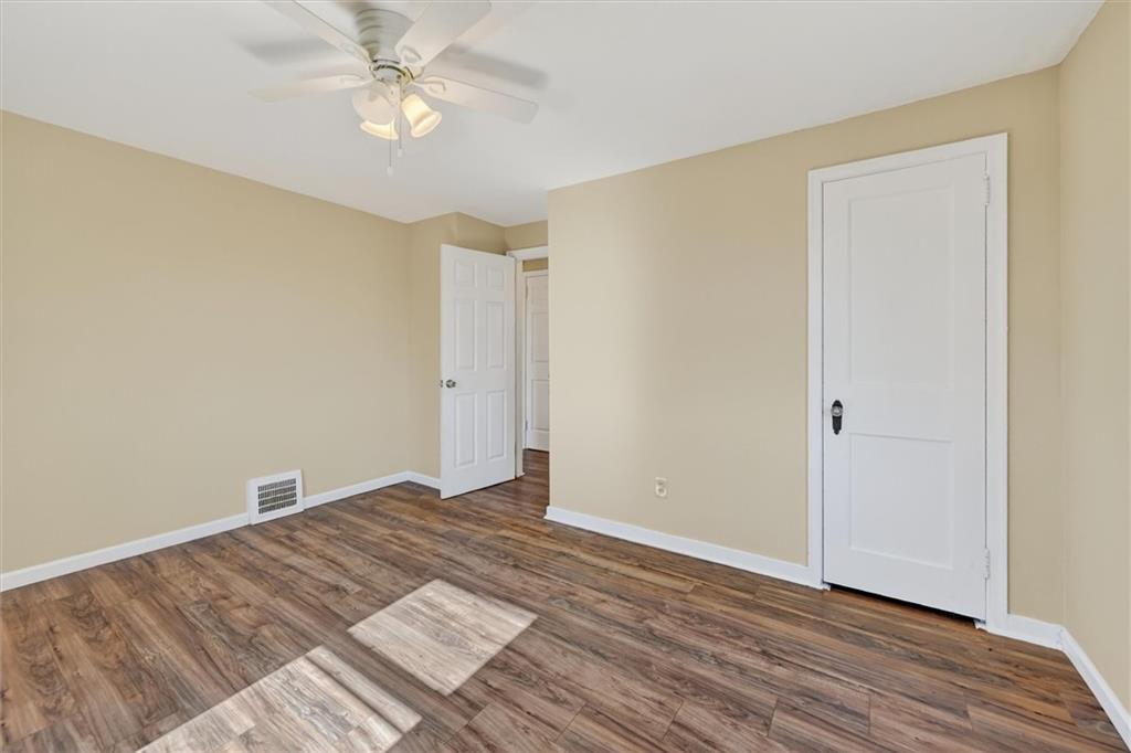 314 Fort Couch Road Pittsburgh, PA 15241 - Photo 12 of 26 a view of empty room with wooden floor