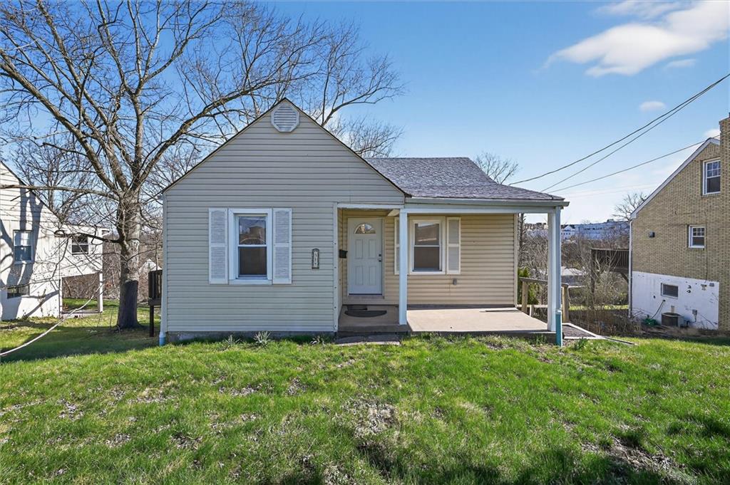 314 Fort Couch Road Pittsburgh, PA 15241 - Photo 2 of 26 a front view of a house with a garden
