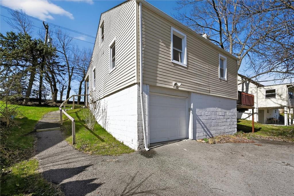 314 Fort Couch Road Pittsburgh, PA 15241 - Photo 21 of 26 a view of a house with a yard
