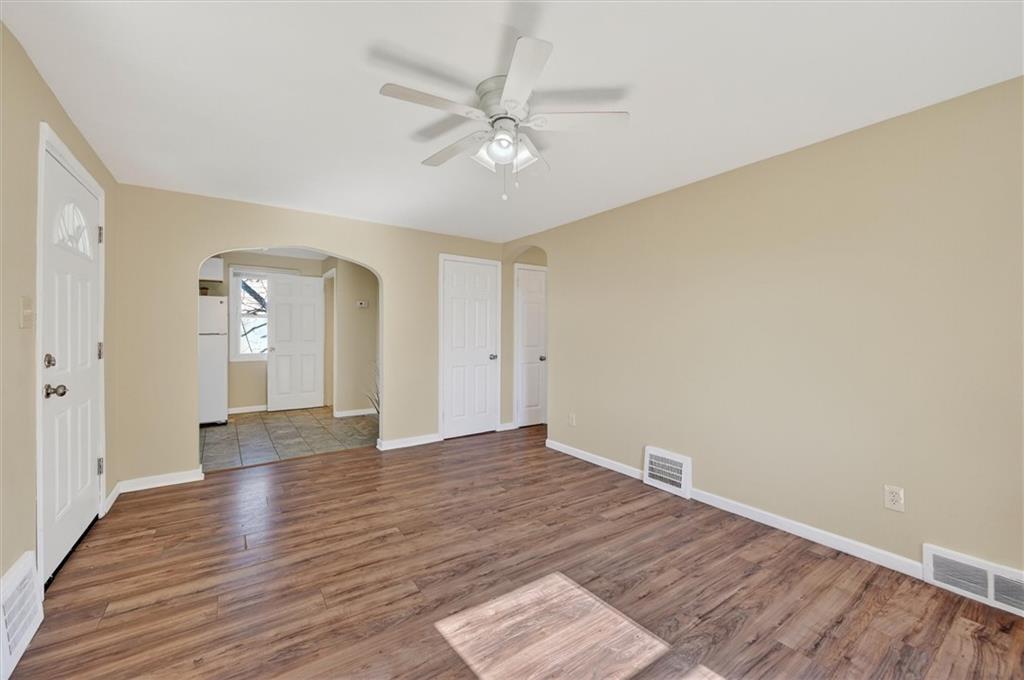 314 Fort Couch Road Pittsburgh, PA 15241 - Photo 5 of 26 a view of an empty room with wooden floor
