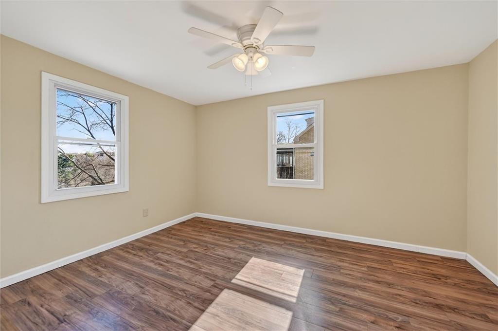 314 Fort Couch Road Pittsburgh, PA 15241 - Photo 6 of 26 a view of a room with wooden floor and window