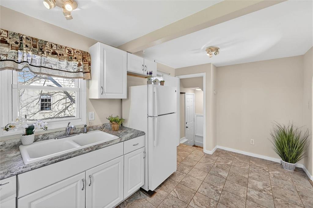 314 Fort Couch Road Pittsburgh, PA 15241 - Photo 10 of 26 a spacious bathroom with a granite countertop sink mirror and a shower