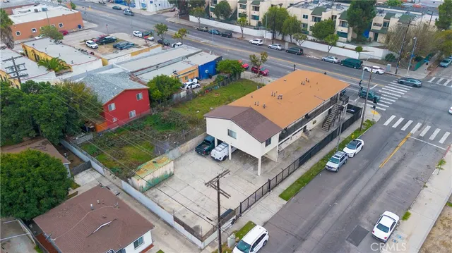 an aerial view of a house with a garden