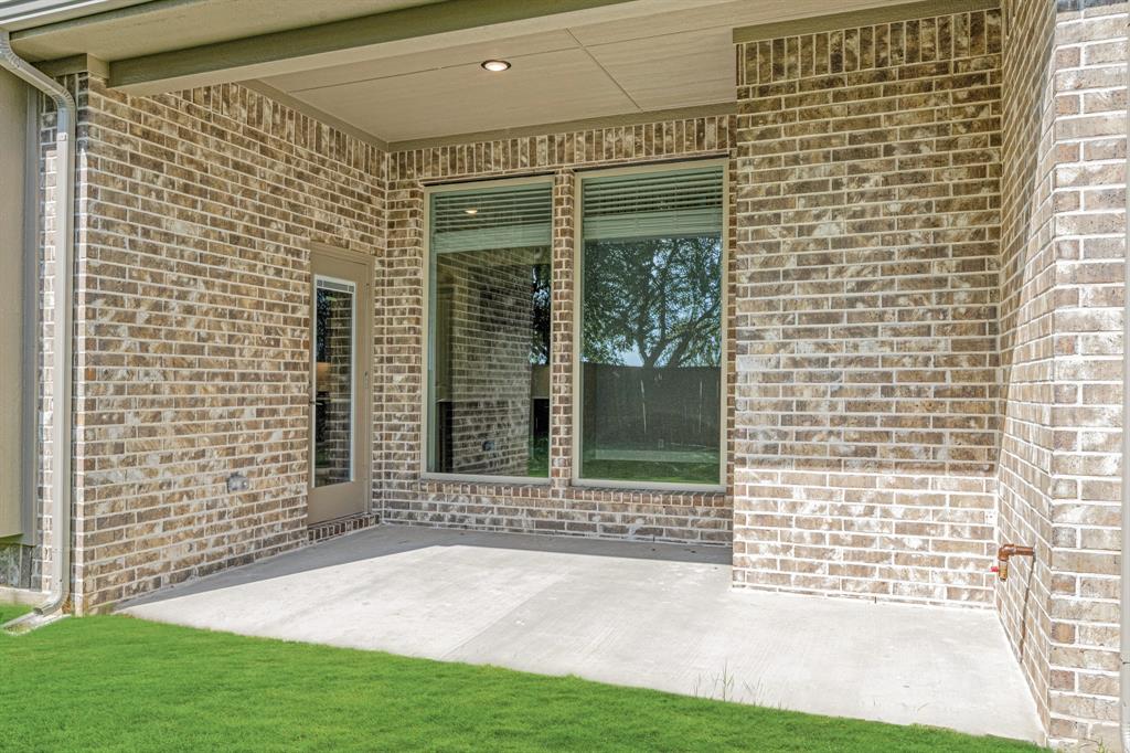 1098 Foxtail Drive Justin, TX 76247 - Photo 37 of 40 a view of house with backyard