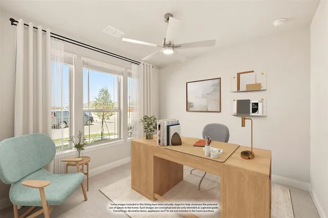 a living room with furniture a table and chairs