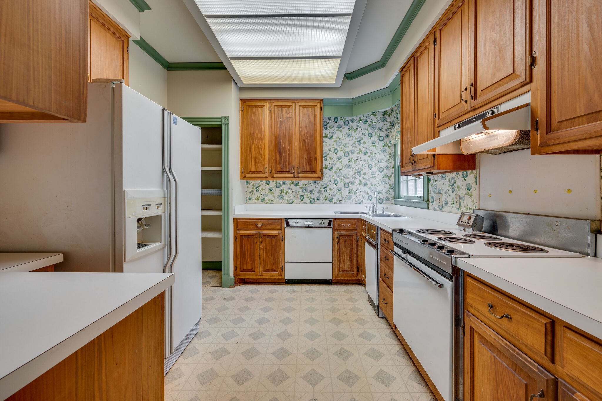 3704 Estes Road, Unit E Nashville, TN 37215 - Photo 12 of 27 a kitchen with stainless steel appliances granite countertop a sink stove and refrigerator