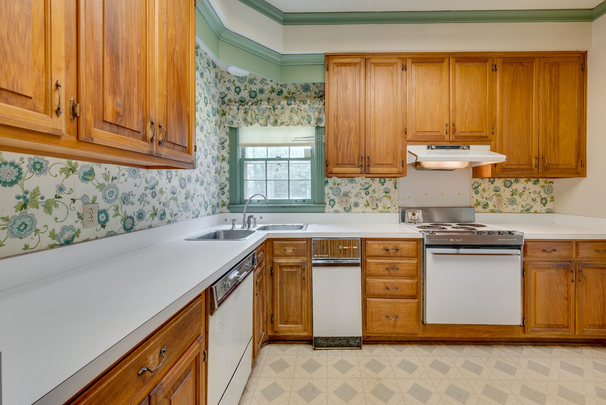 3704 Estes Road, Unit E Nashville, TN 37215 - Photo 13 of 27 a kitchen with stainless steel appliances granite countertop wooden cabinets a sink and a stove