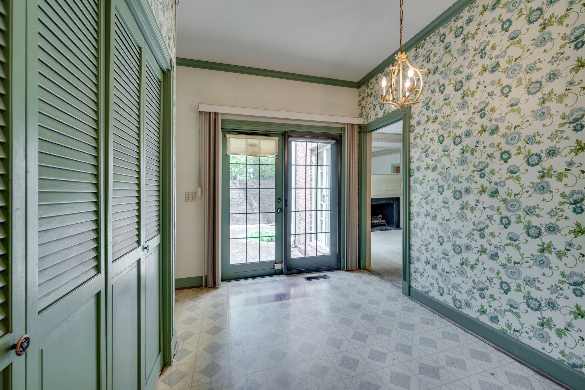 3704 Estes Road, Unit E Nashville, TN 37215 - Photo 15 of 27 a view of an empty room with a fireplace and a window