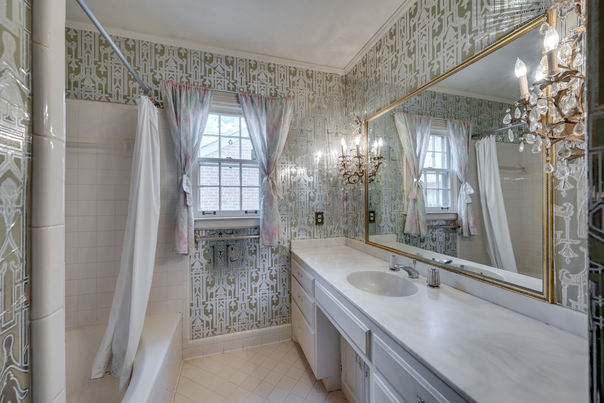 3704 Estes Road, Unit E Nashville, TN 37215 - Photo 18 of 27 a bathroom with a double vanity sink and a bathtub