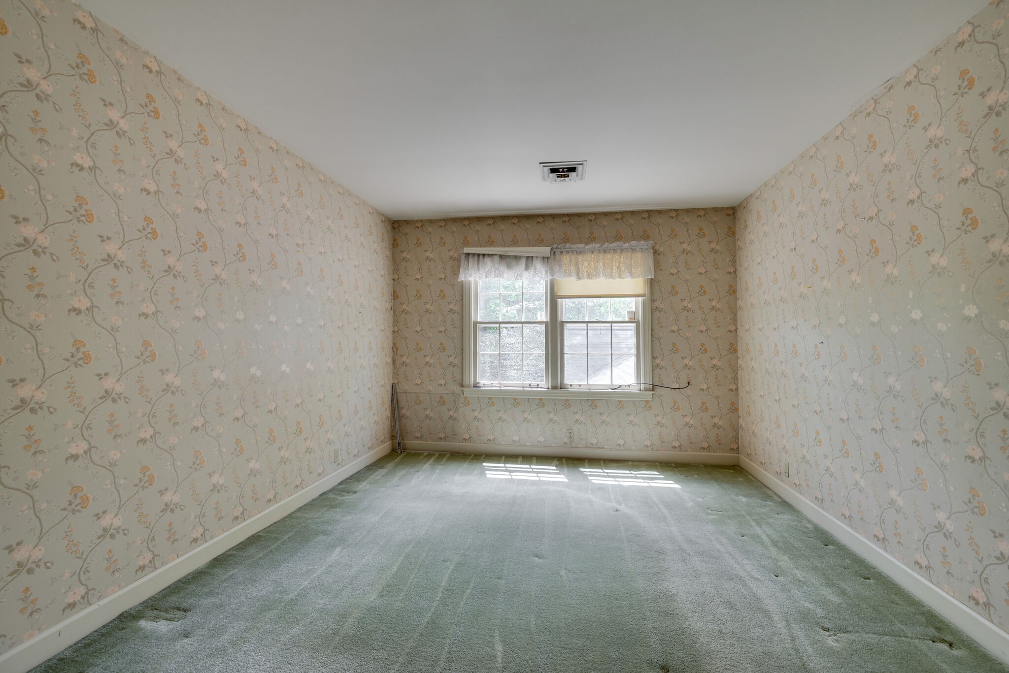 3704 Estes Road, Unit E Nashville, TN 37215 - Photo 19 of 27 an empty room with a window