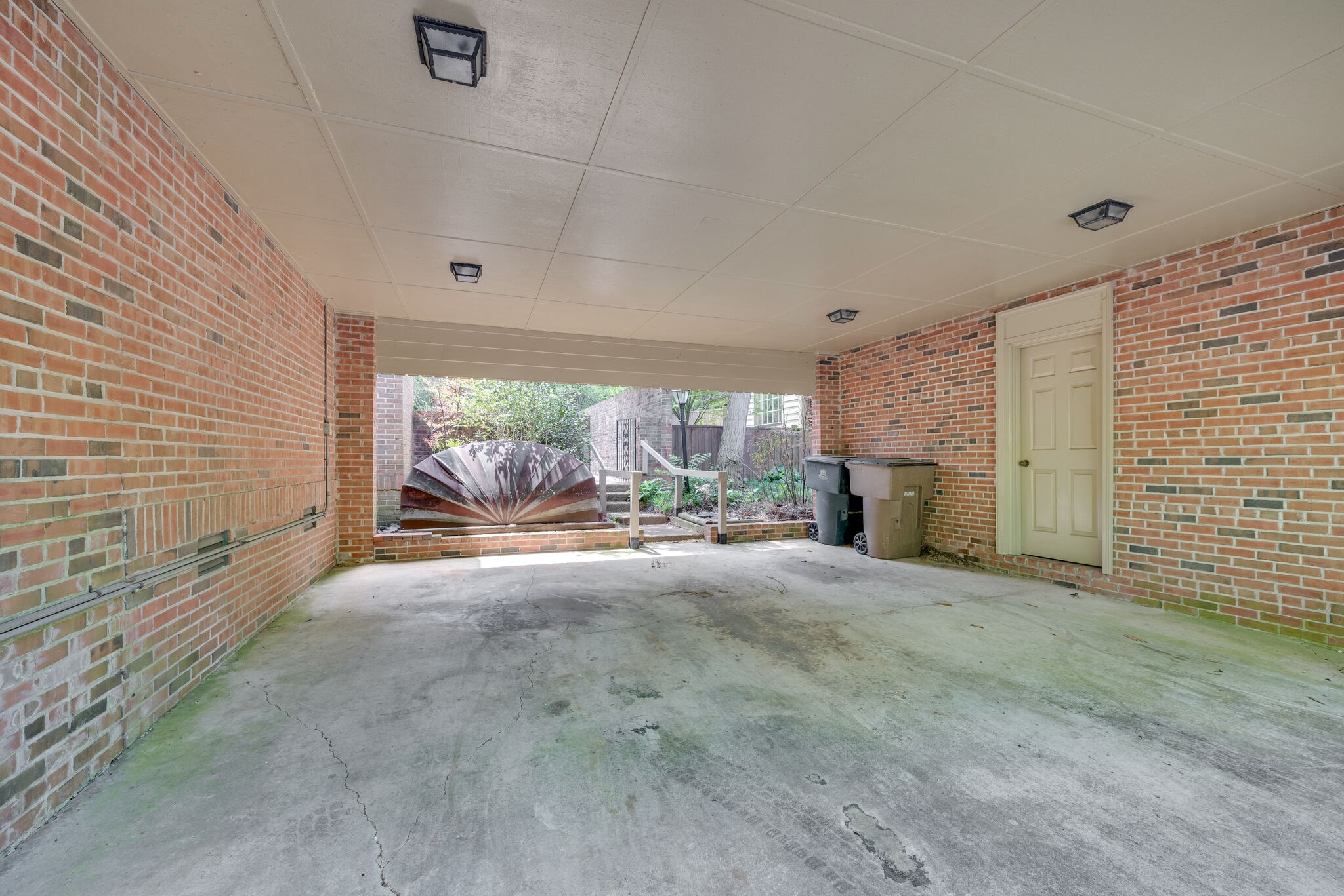 3704 Estes Road, Unit E Nashville, TN 37215 - Photo 22 of 27 a view of a livingroom with a patio and garden view