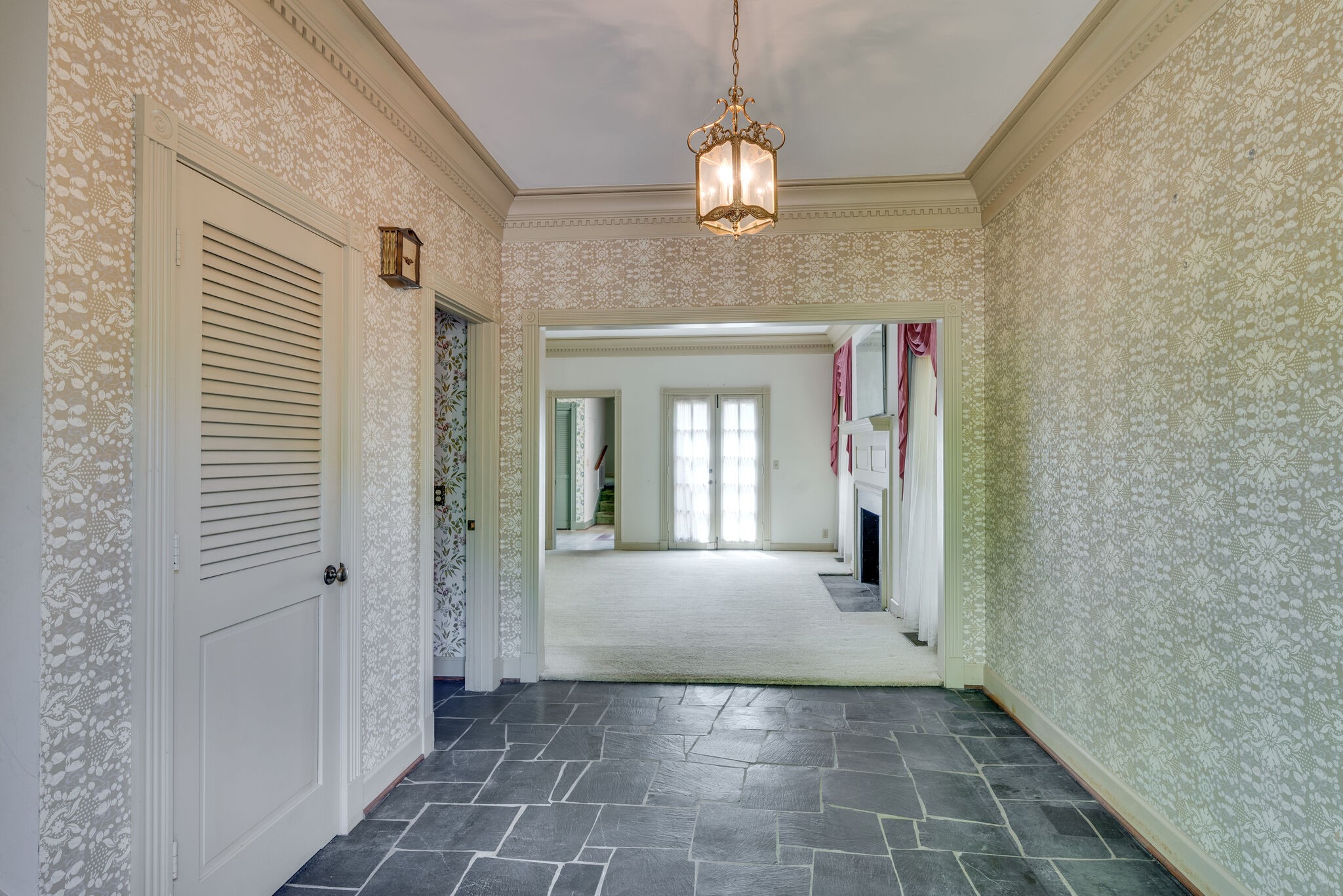3704 Estes Road, Unit E Nashville, TN 37215 - Photo 4 of 27 a view of a hallway with a chandelier