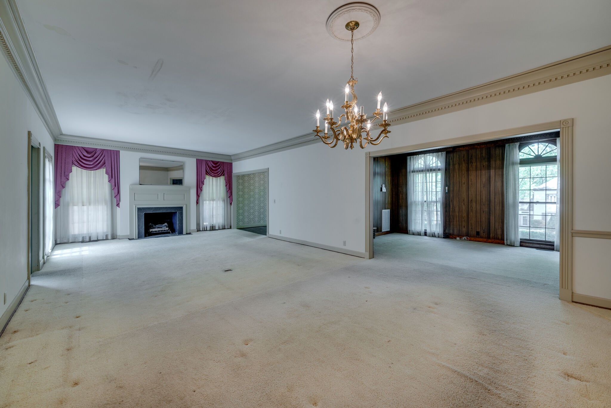 3704 Estes Road, Unit E Nashville, TN 37215 - Photo 9 of 27 a view of a livingroom with a chandelier fireplace and a chandelier