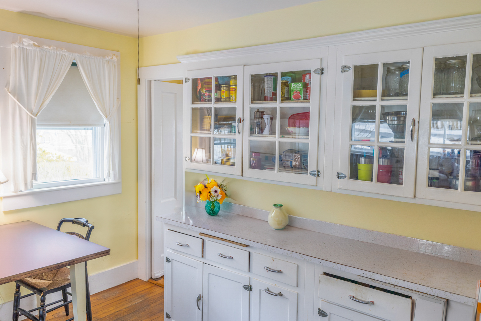 35 West Chester Street Nantucket, MA 02554 - Photo 4 of 14 a kitchen with a sink and a window