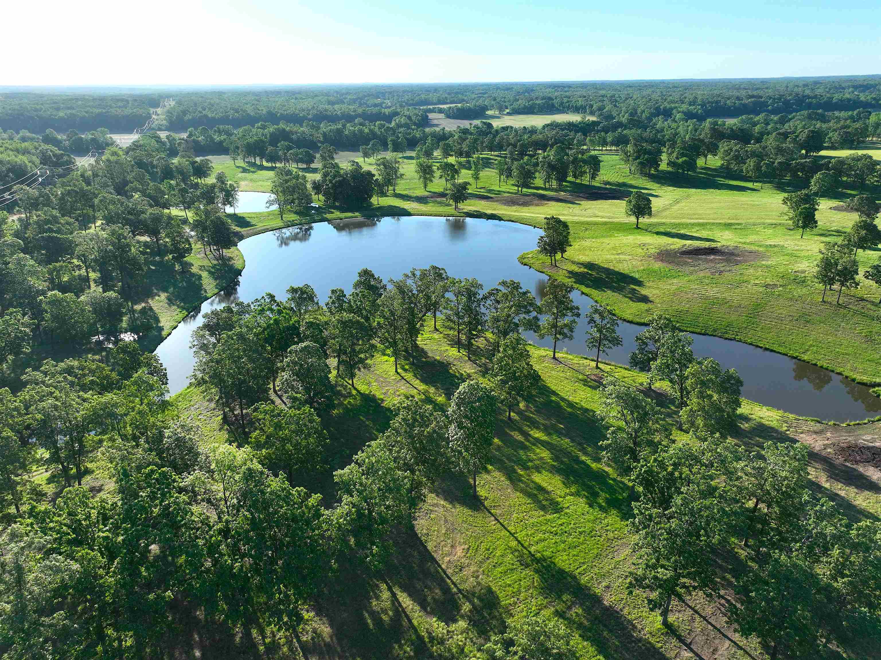 1865 Slayden Road Moscow, TN 38057 - Photo 29 of 30 Aerial view of property's location featuring a large body of water