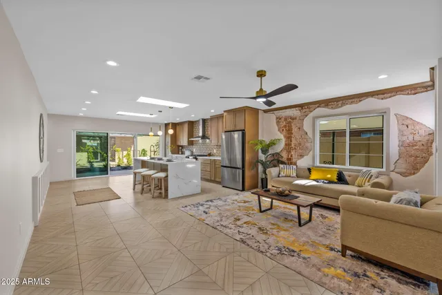 a living room with furniture and a table