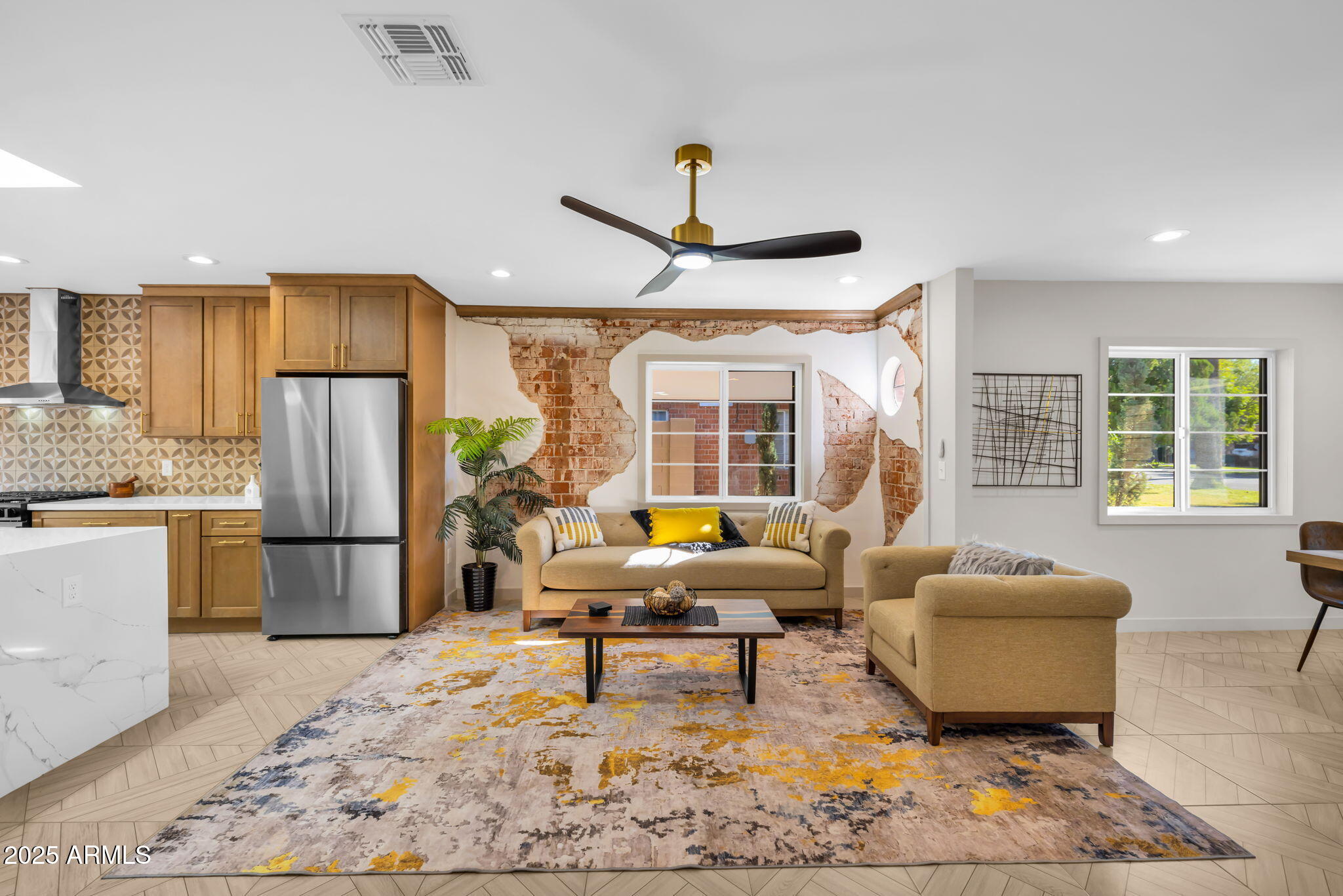 1540 East Cheery Lynn Road Phoenix, AZ 85014 - Photo 15 of 46 a living room with furniture and a refrigerator