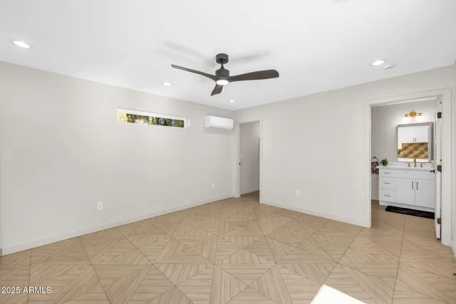 a view of a livingroom with a kitchen