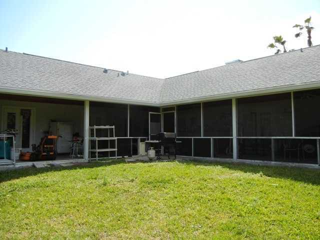 9759 Sandy Run Road Jupiter, FL 33478 - Photo 4 of 7 a house view with a outdoor space