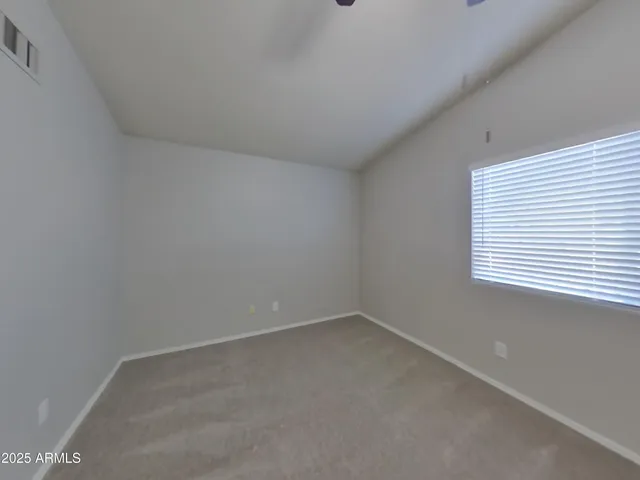 a kitchen with stainless steel appliances granite countertop a sink a stove a refrigerator and a oven