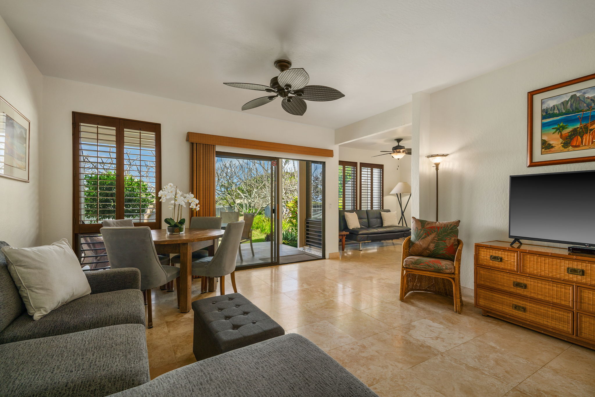 1901 Poipu Road, Unit 212 Koloa, HI 96756 - Photo 11 of 30 a living room with furniture and a flat screen tv