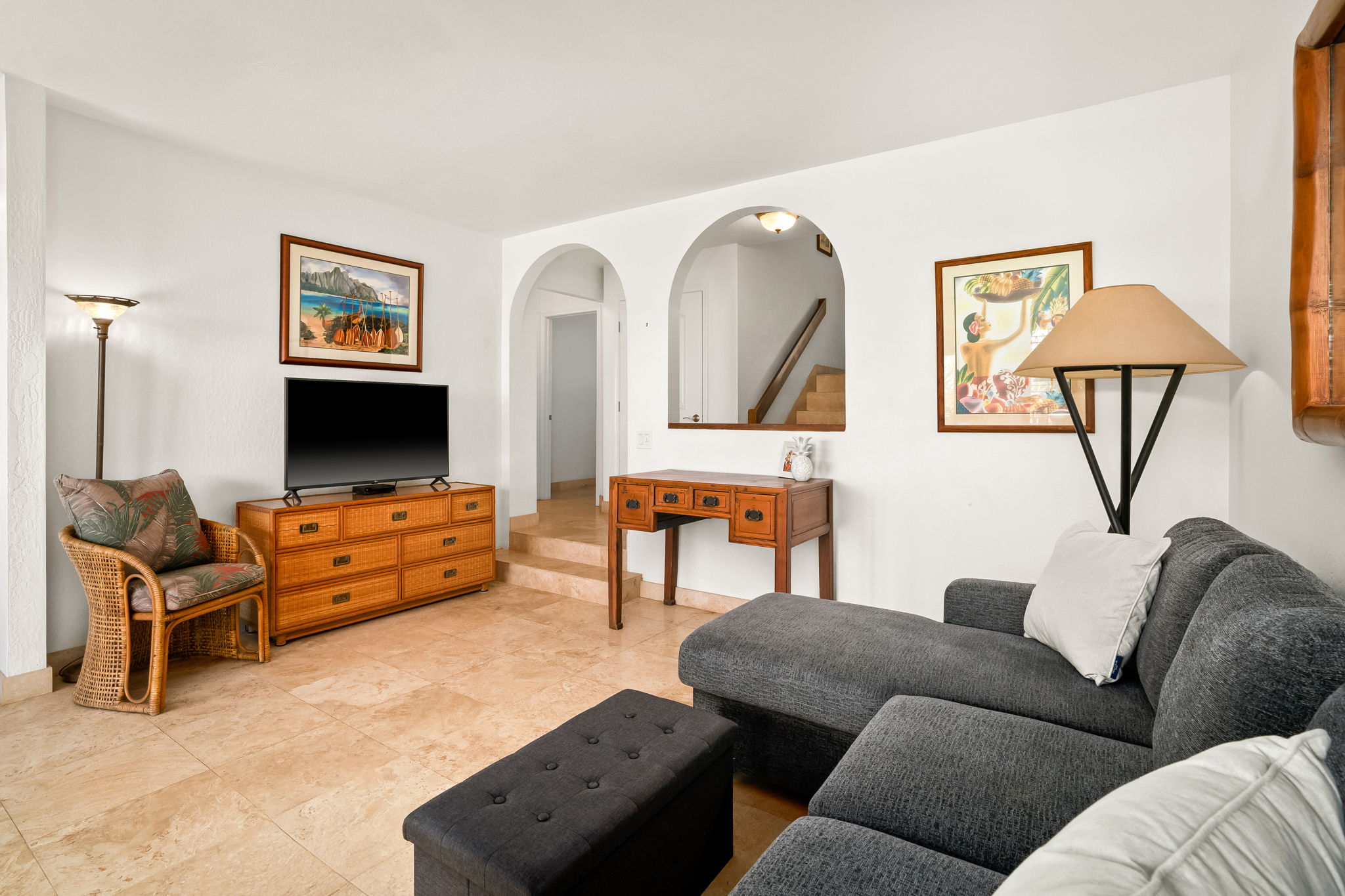 1901 Poipu Road, Unit 212 Koloa, HI 96756 - Photo 13 of 30 a living room with furniture and a flat screen tv