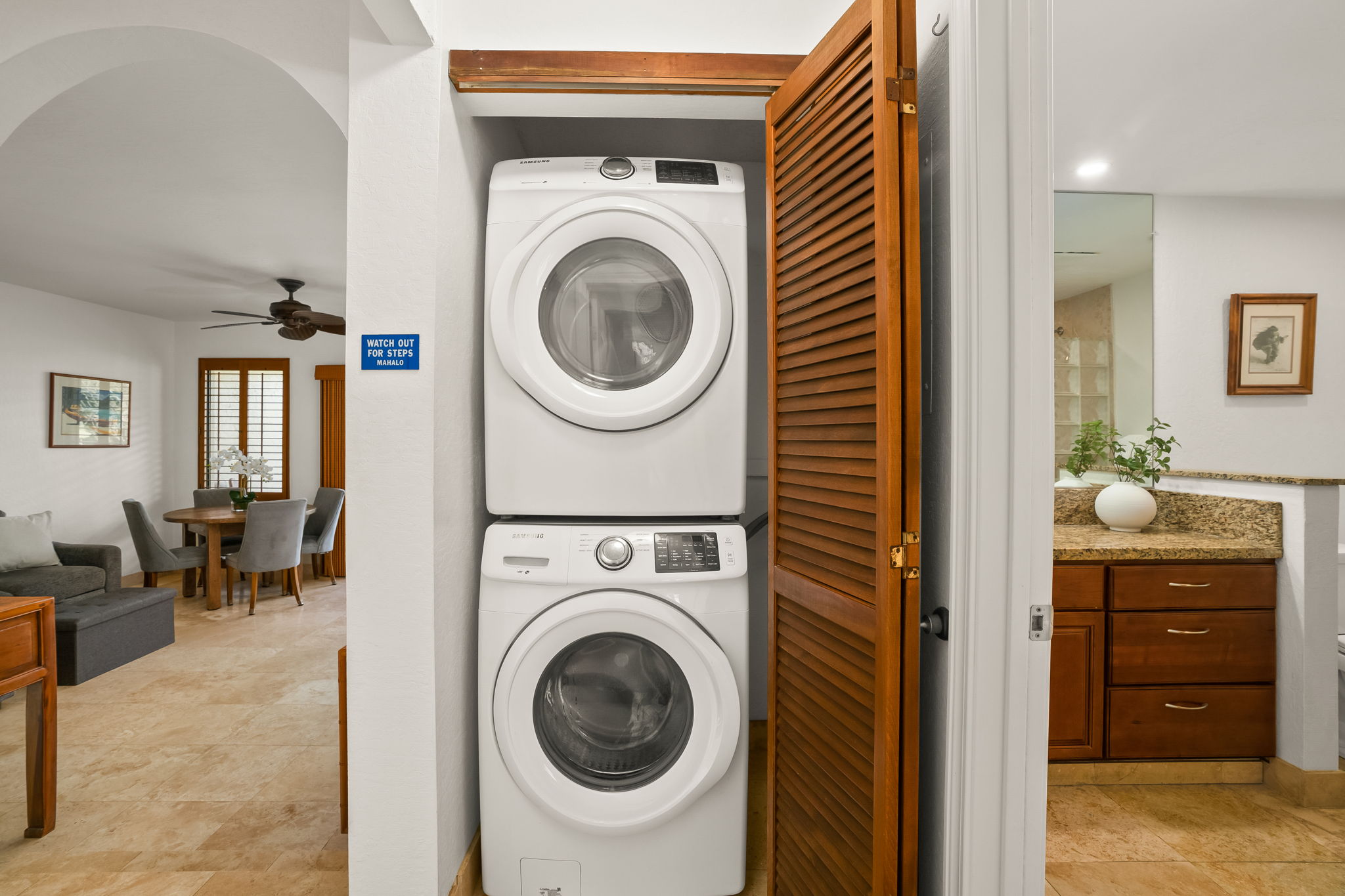 1901 Poipu Road, Unit 212 Koloa, HI 96756 - Photo 23 of 30 a view of a hallway with washer and dryer