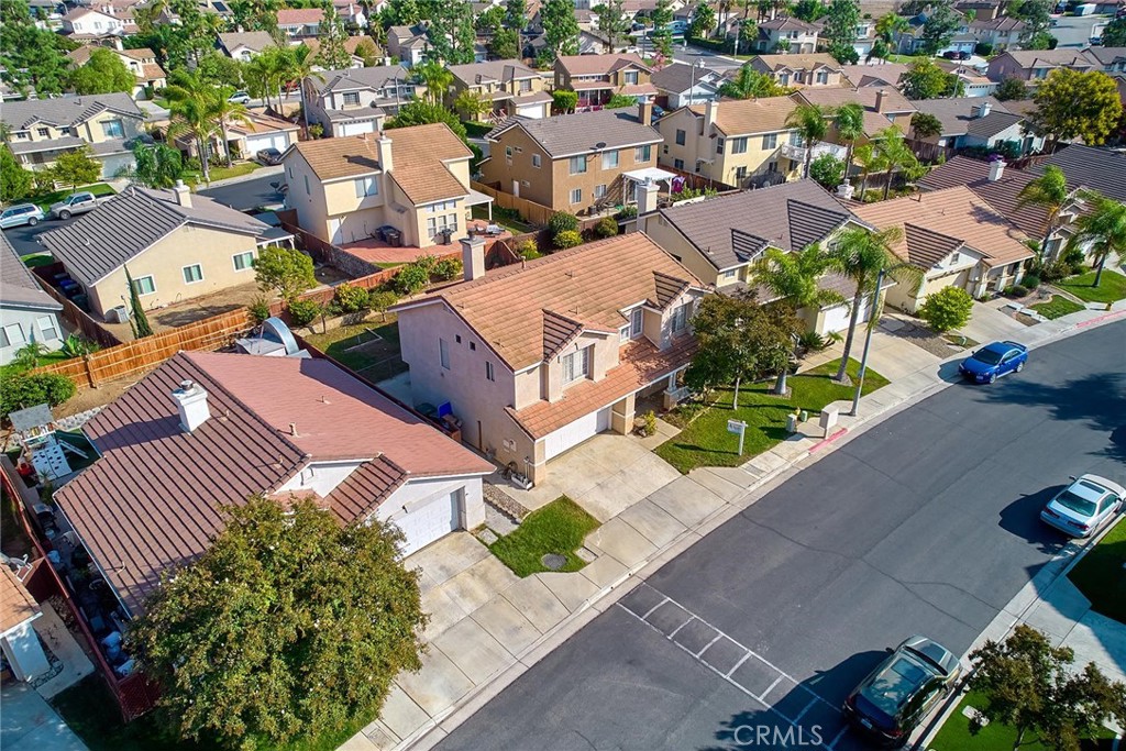5280 Melbourne Place Riverside, CA 92508 - Photo 2 of 59 an aerial view of a house with a yard and outdoor seating