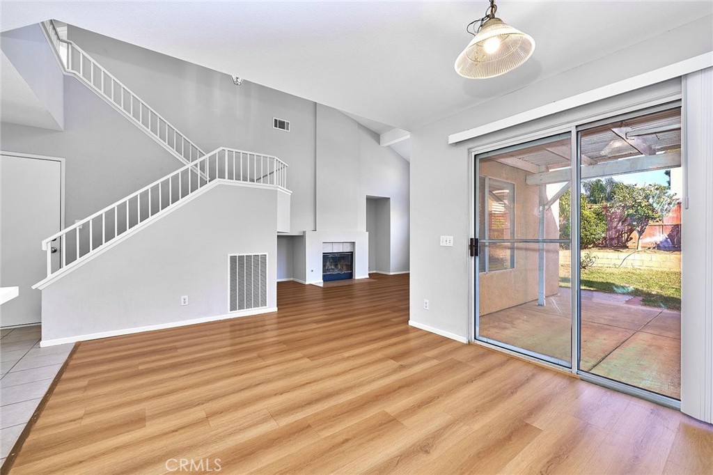 5280 Melbourne Place Riverside, CA 92508 - Photo 21 of 59 a view of empty room with wooden floor and fan